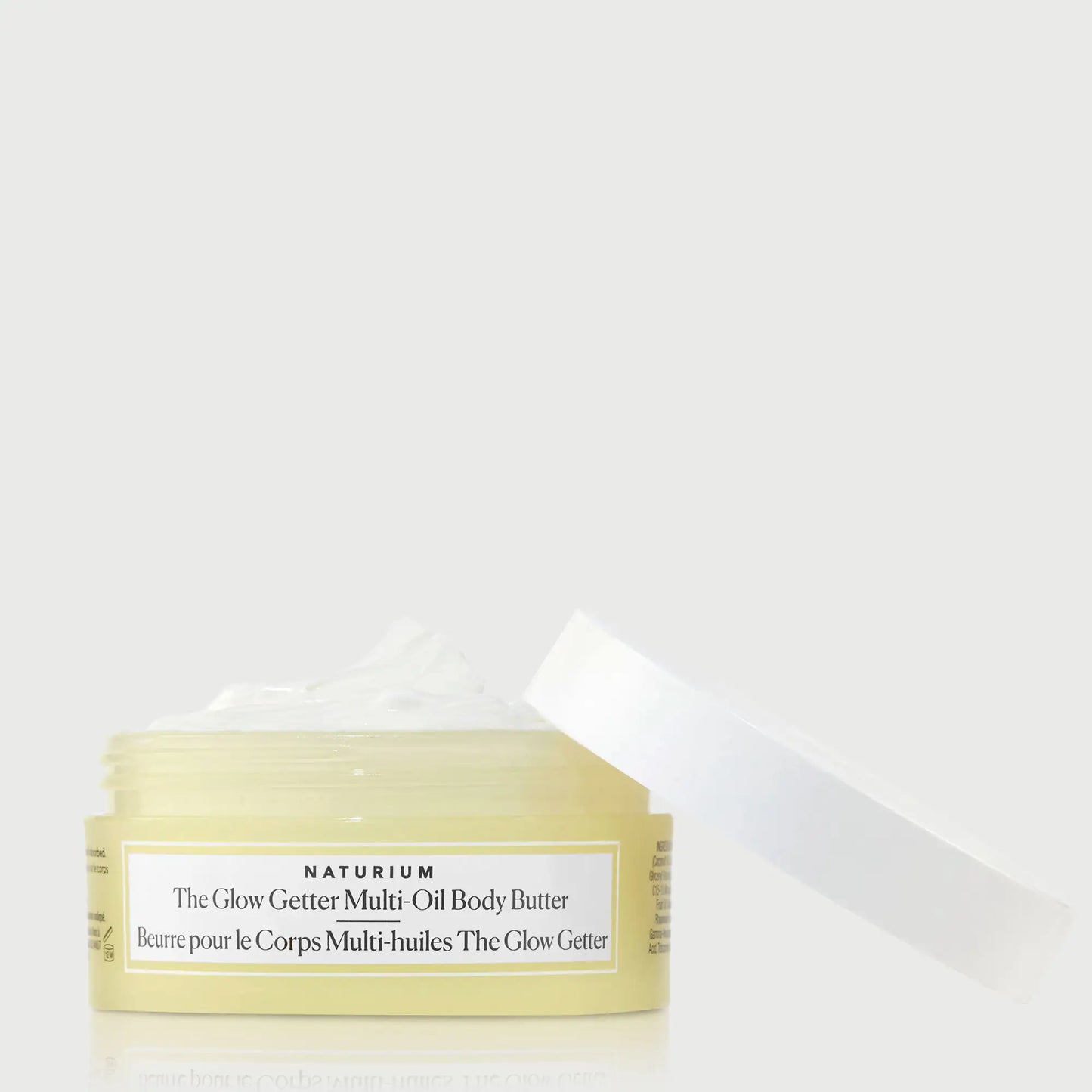 the-glow-getter-multi-oil-body-butter-travel-size-f6 NATR-40115_Glow-Getter-Body-Butter-Mini_front_capoff_bonebkgd.webp